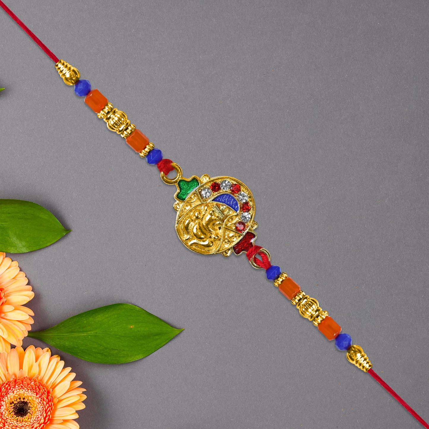 Ganesh Face Rakhi With Colorful Beads And Stones