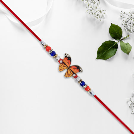 Vibrant Butterfly Rakhi With Colorful Beads Red Mauli Thread