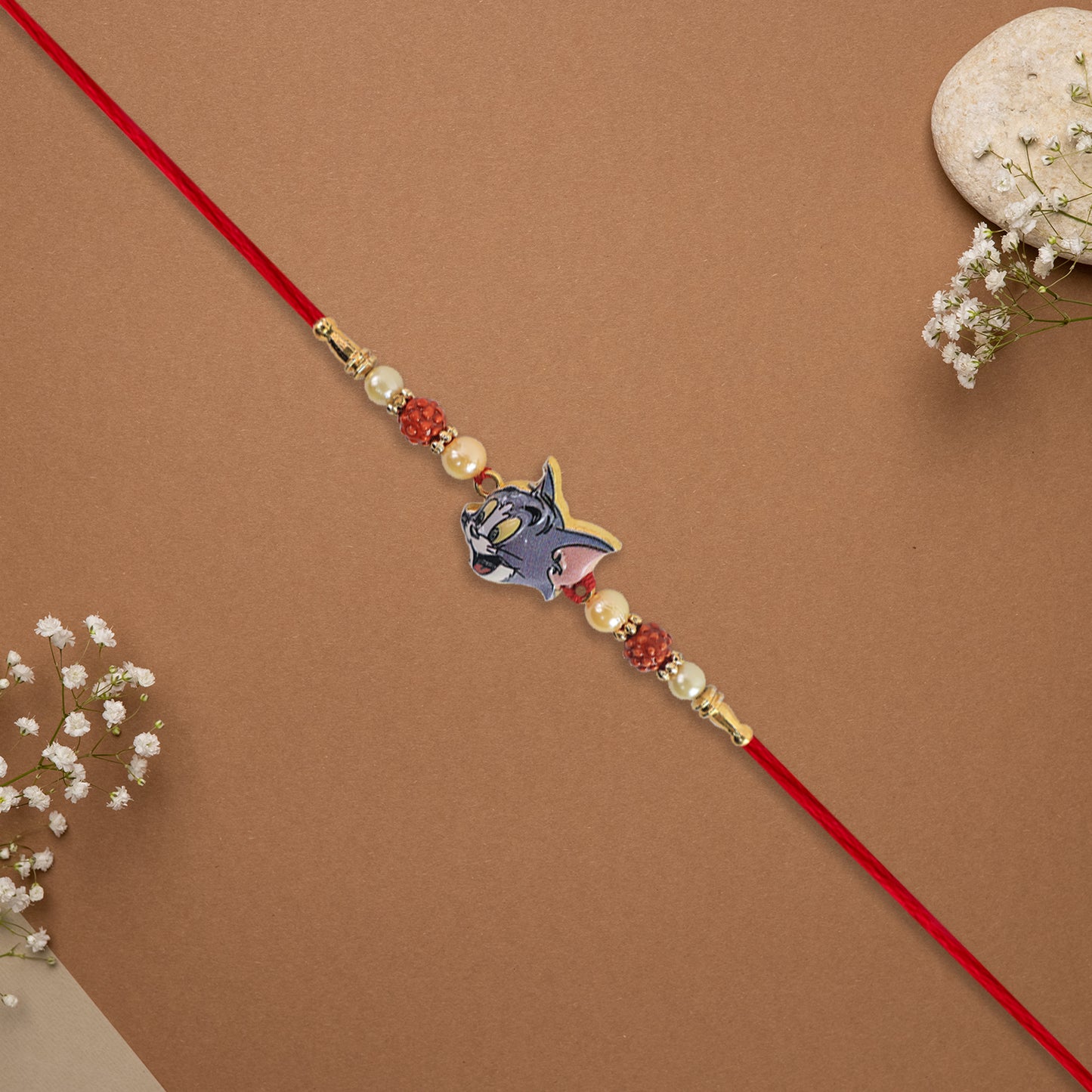Cute Tom Character Rakhi With Rudraksha  Pearl Beads On Red Thread