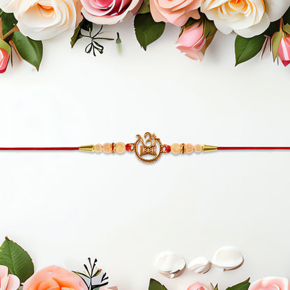 Designer Religious Rakhi With Golden Om And Swastik Motif And Pearl Beads On Red Thread