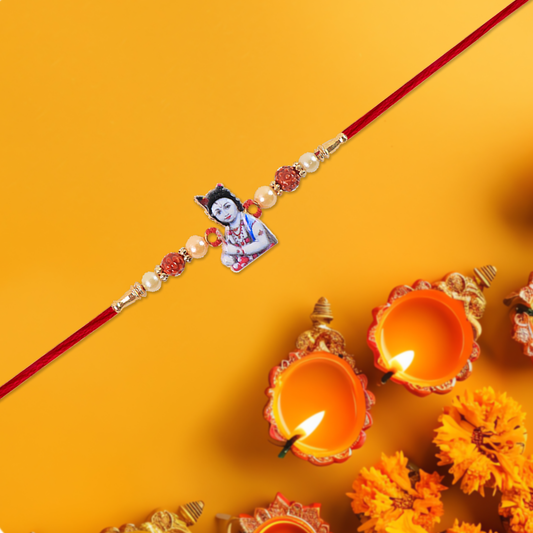 Elegant Krishna Rudraksha Rakhi With Pearls  Red Mauli Thread