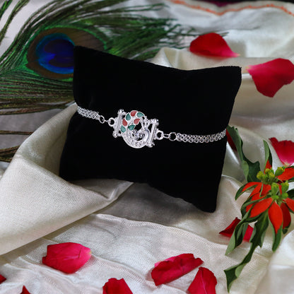 Silver Finish  Rakhi With Red-green Enamel