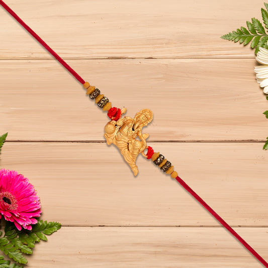 Lord Ganesha Rakhi With Beaded Thread