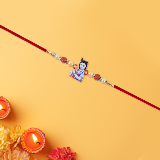 Elegant Krishna Rudraksha Rakhi With Pearls  Red Mauli Thread